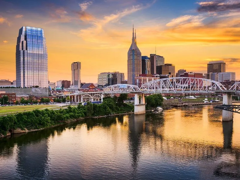 Nashville skyline at golden hour over the Cumberland River